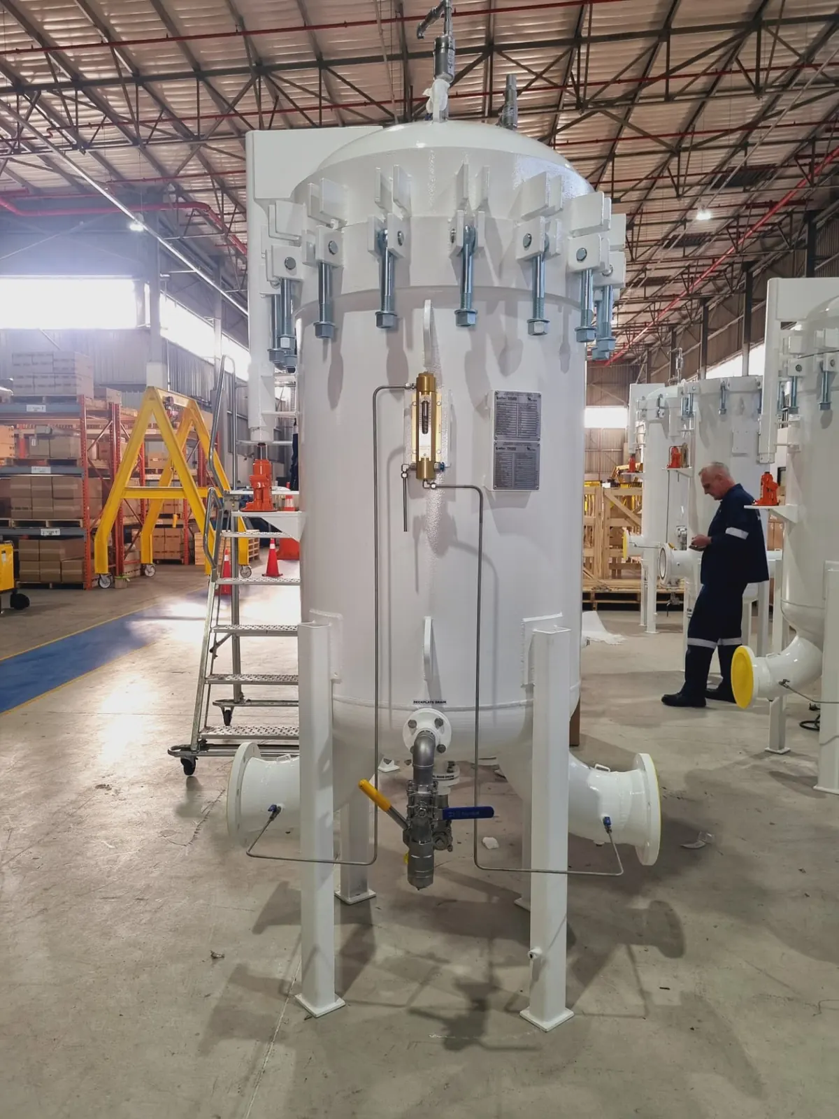 Completed vertical filter vessel finished in white protective coating