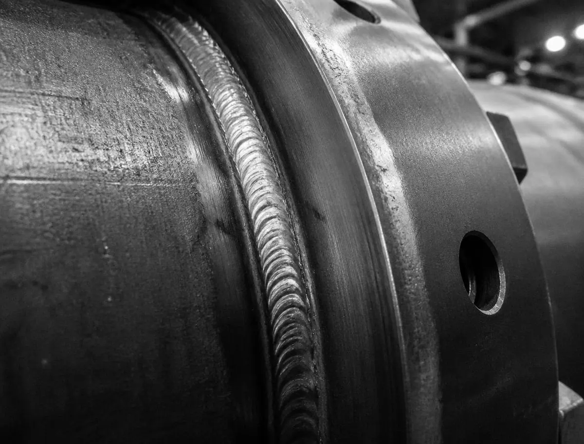 Close-up of a precision weld seam on a pressure vessel flange